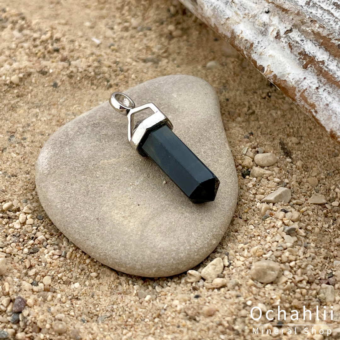 Pendentif en argent à double extrémité oeil de faucon