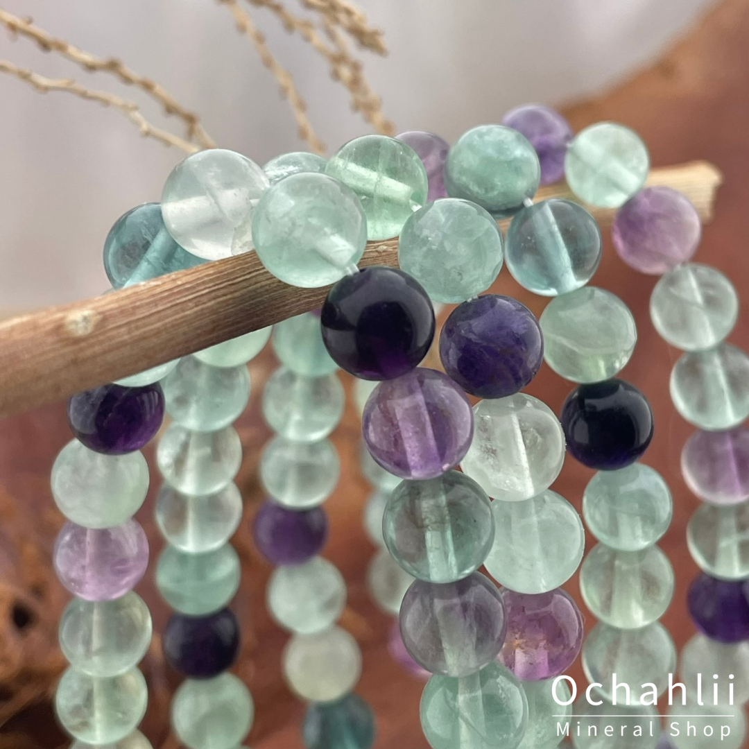 Fluoriet groen-paars armband 8mm