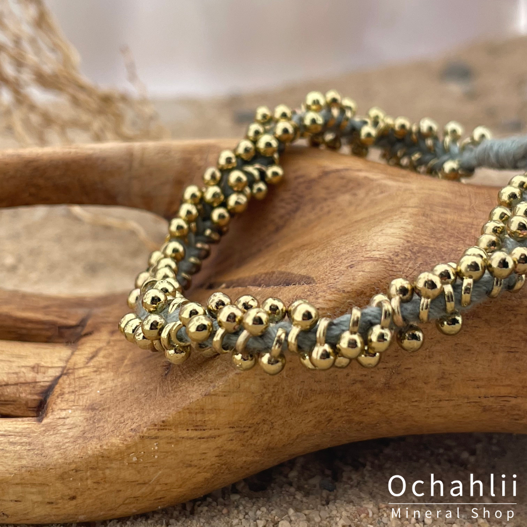 Pulsera étnica color dorado/azul aqua