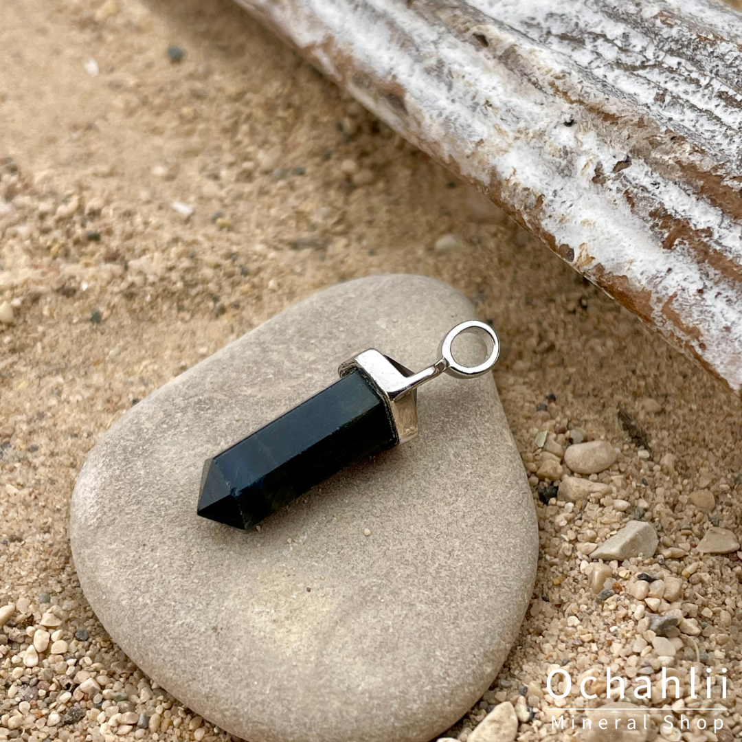 Pendentif en argent à double extrémité oeil de faucon